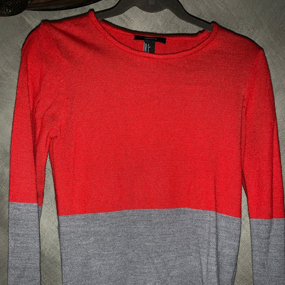 red and gray sweater